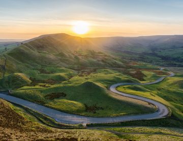 Ascent of Open Access Report Cover - Sunset in the Peak District with long winding road