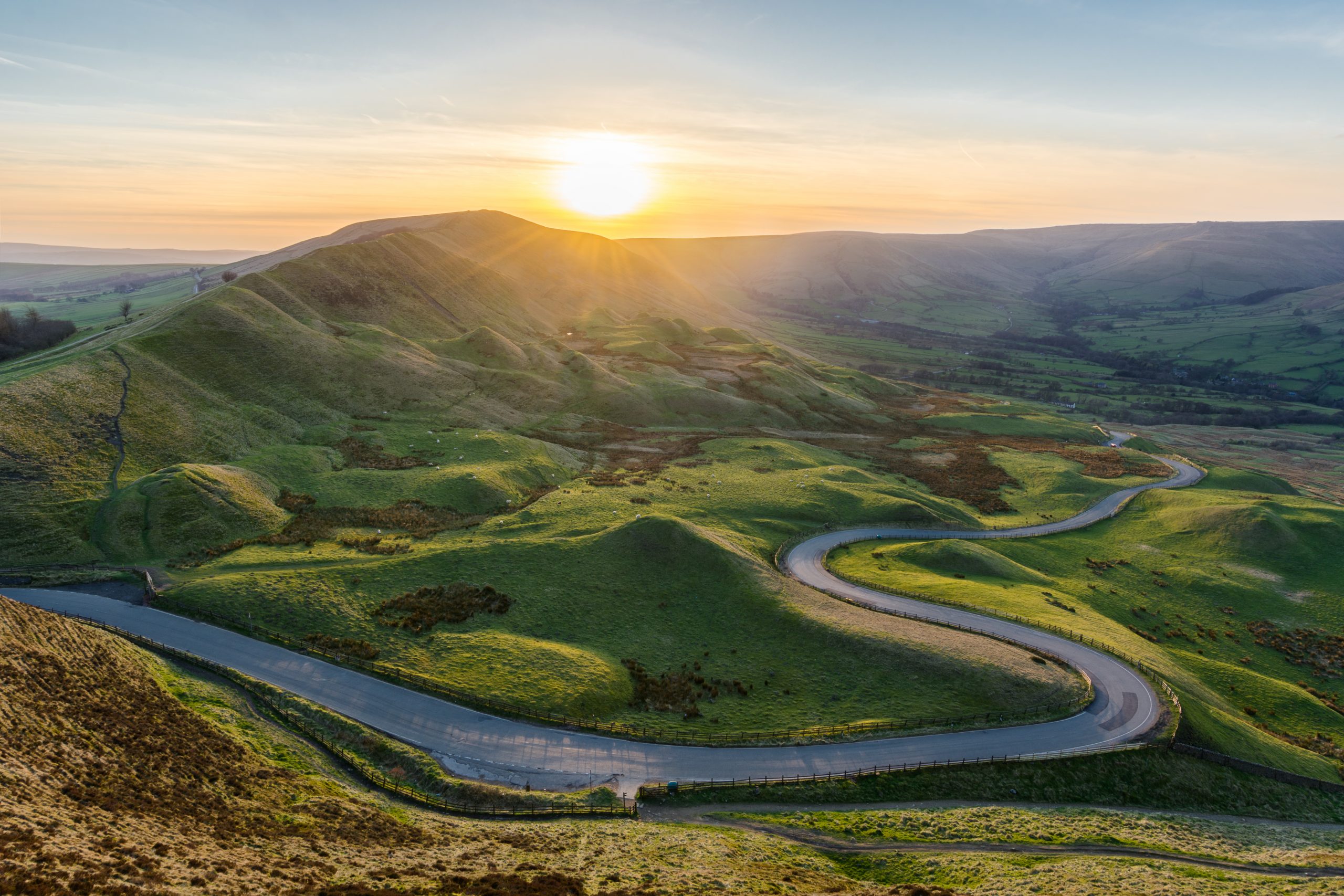 Ascent of Open Access Report Cover - Sunset in the Peak District with long winding road