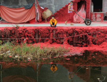 Rivwer in China impacted by red dye.