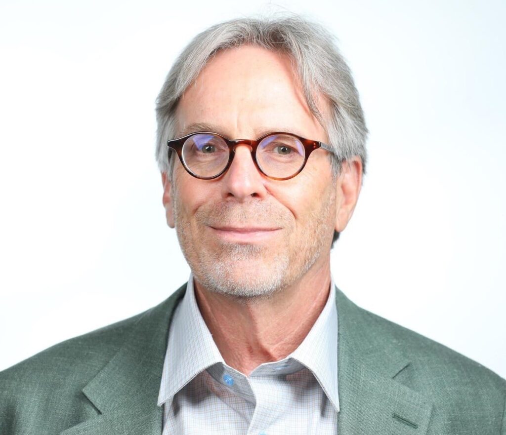 Dr Raym Crow