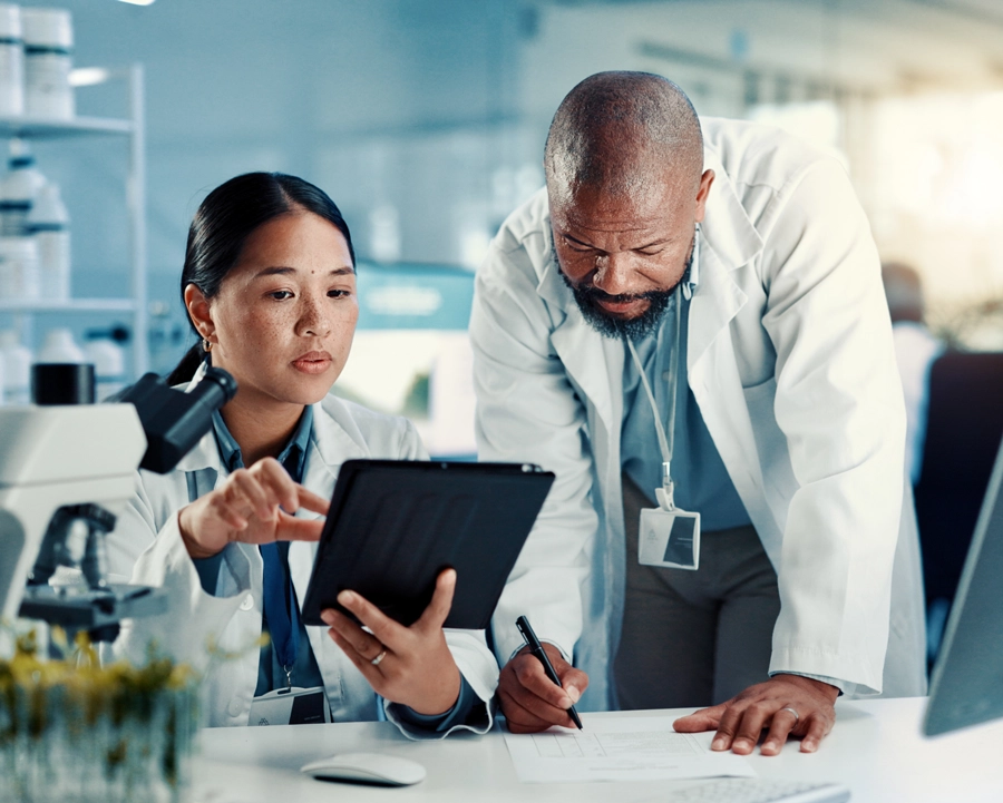 researchers at work in lab